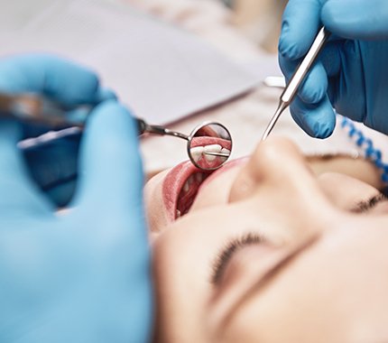 Woman undergoing dental exam