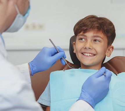 Child talking to a dentist