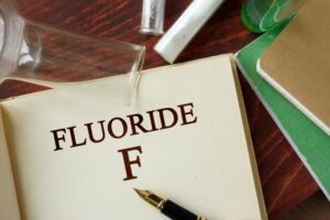 Book with "fluoride" written in large letters